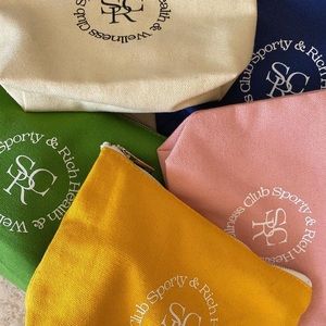 Sporty & Rich Club Canvas Zip Pouch in Cream/Tan